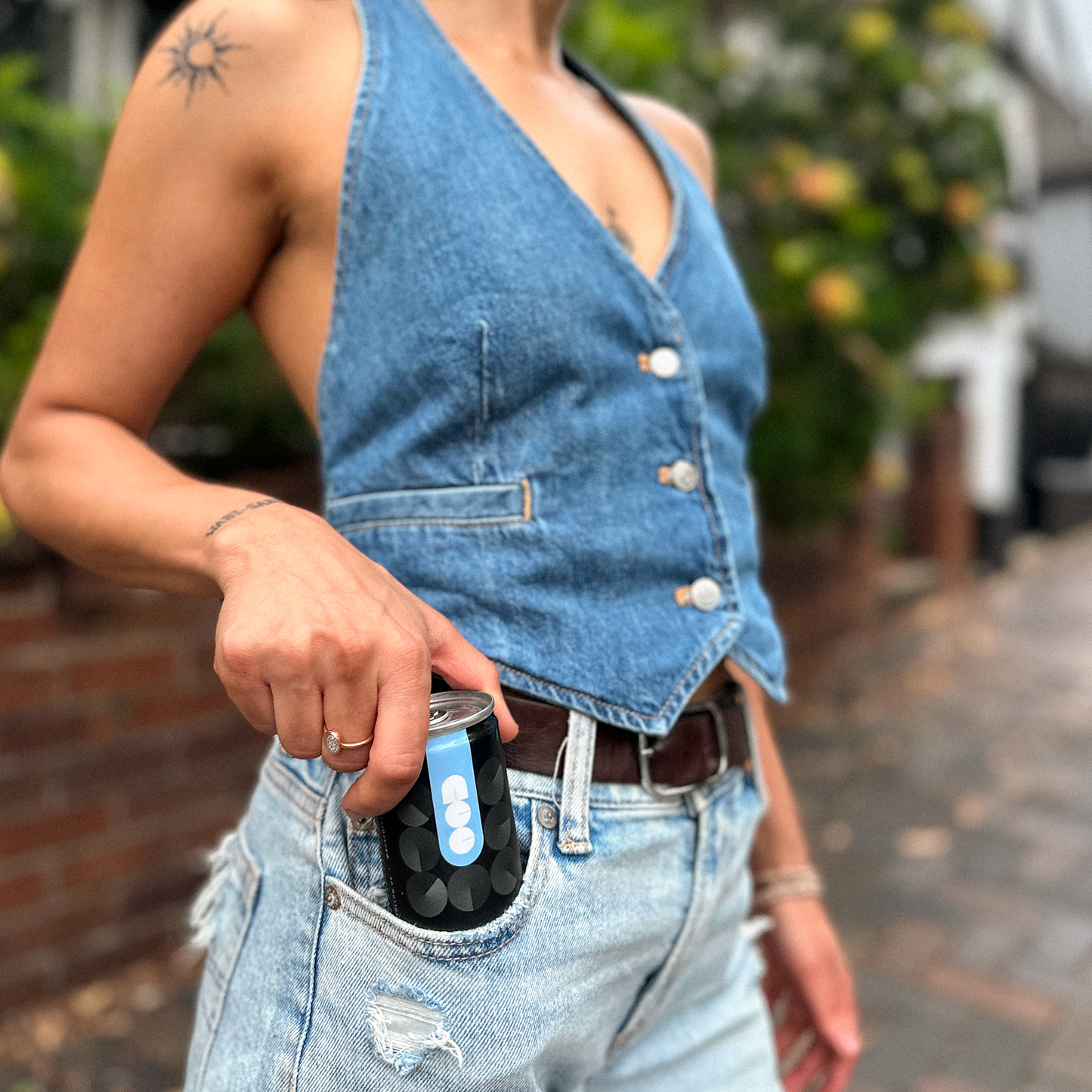 Australian Coffee Culture Long Black can in a jeans pocket